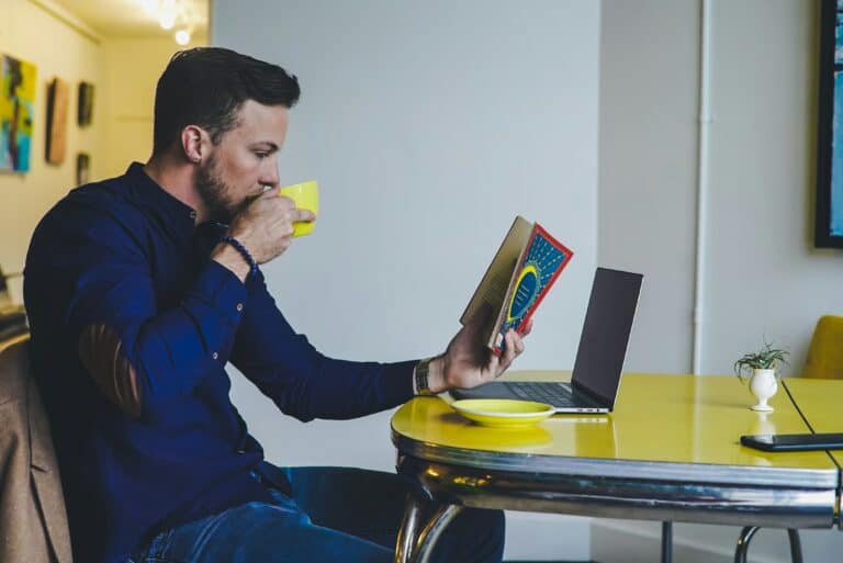 man reading book