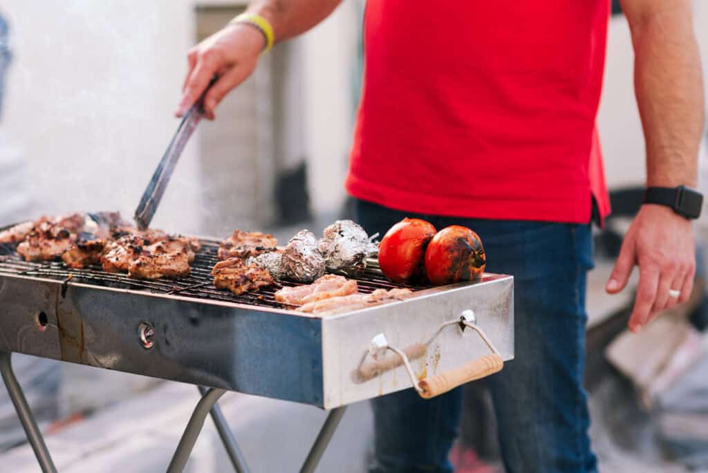 man grilling