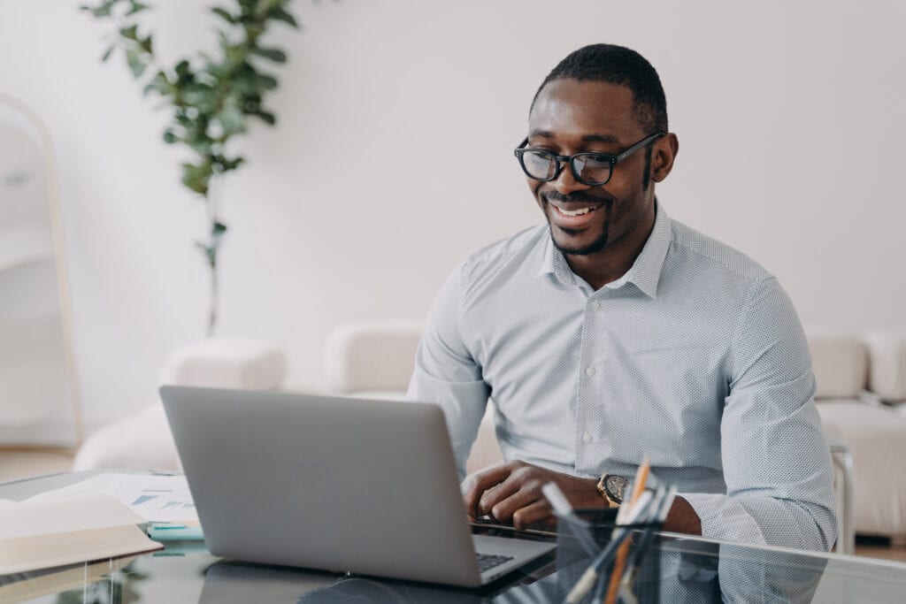 man working on finances