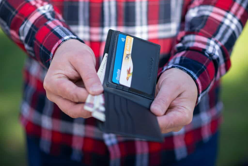 man holding wallet