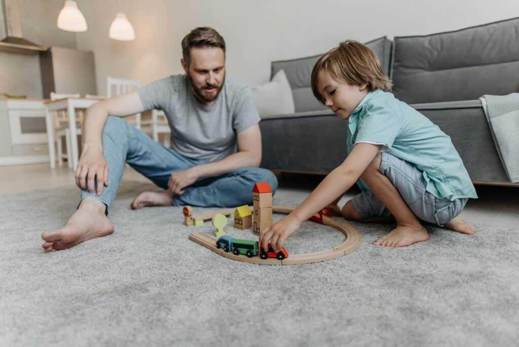 dad playing with child