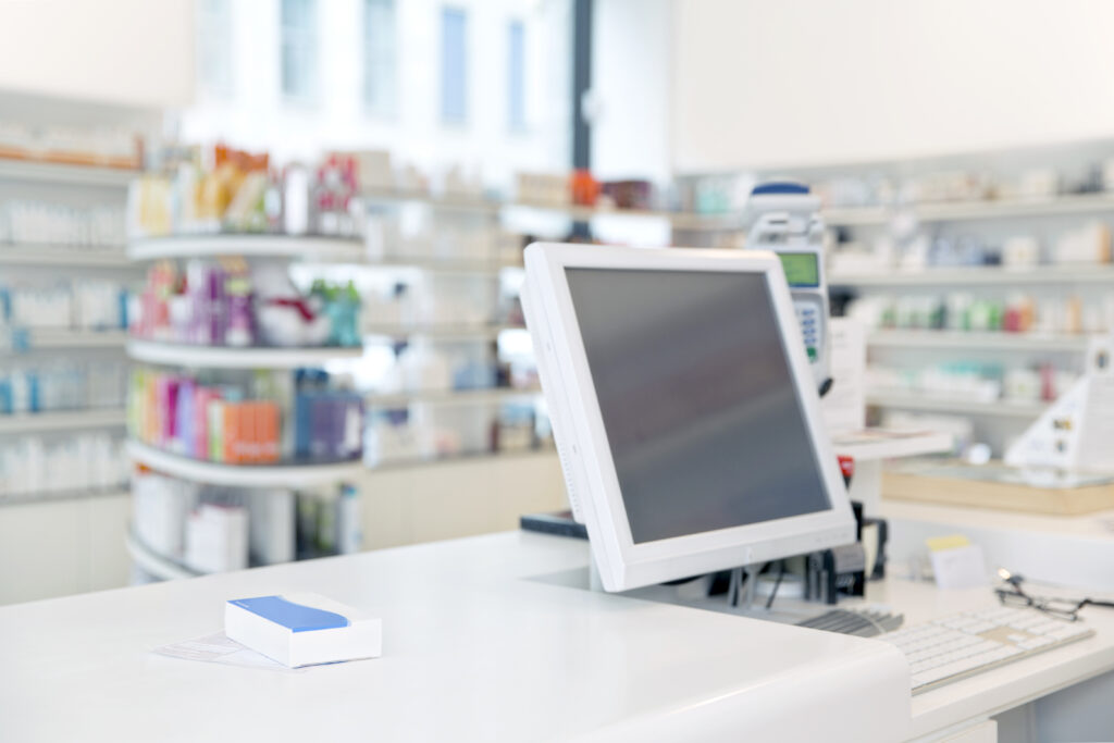 Prescription and drug lying on counter of a pharmacy